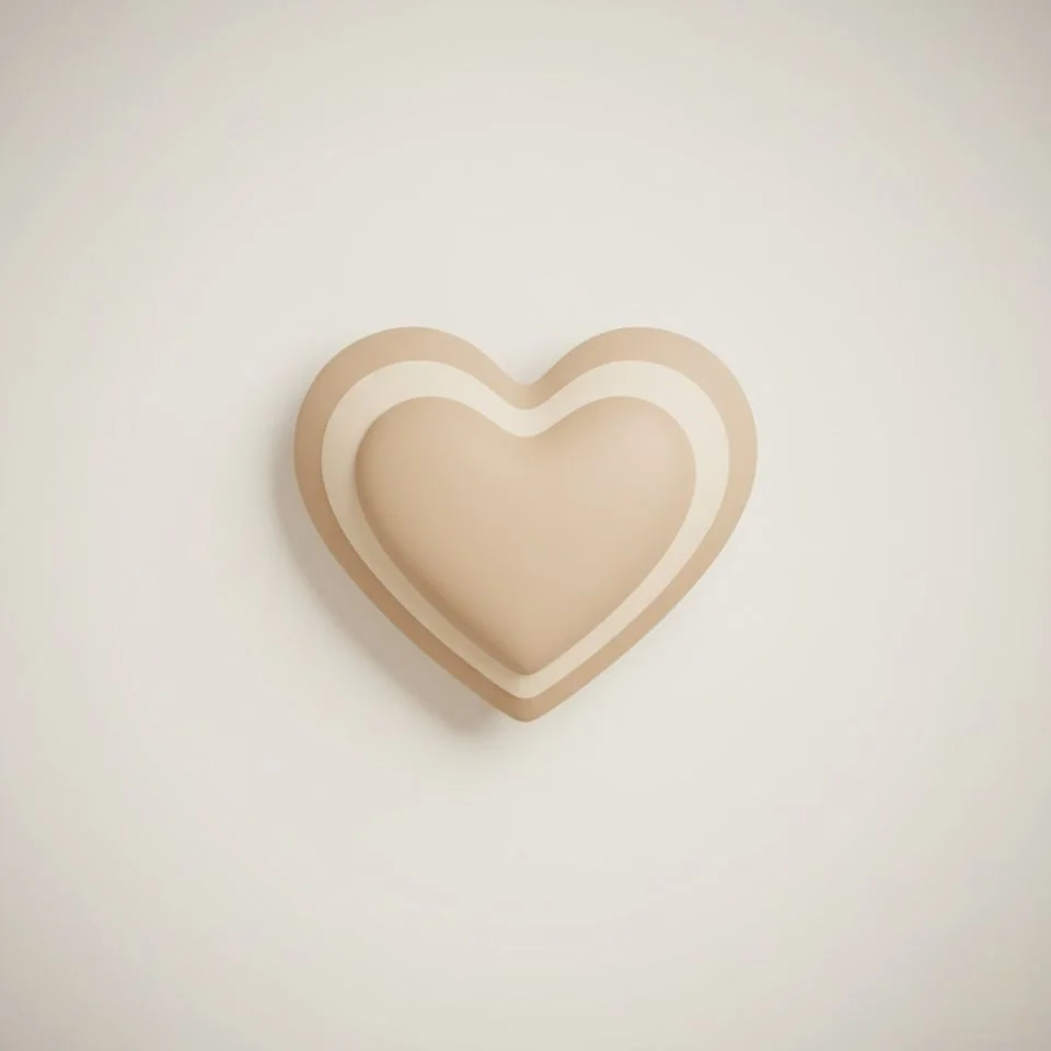 aesthetic-heart-pfp-minimal-soft Minimal beige aesthetic heart on plain background